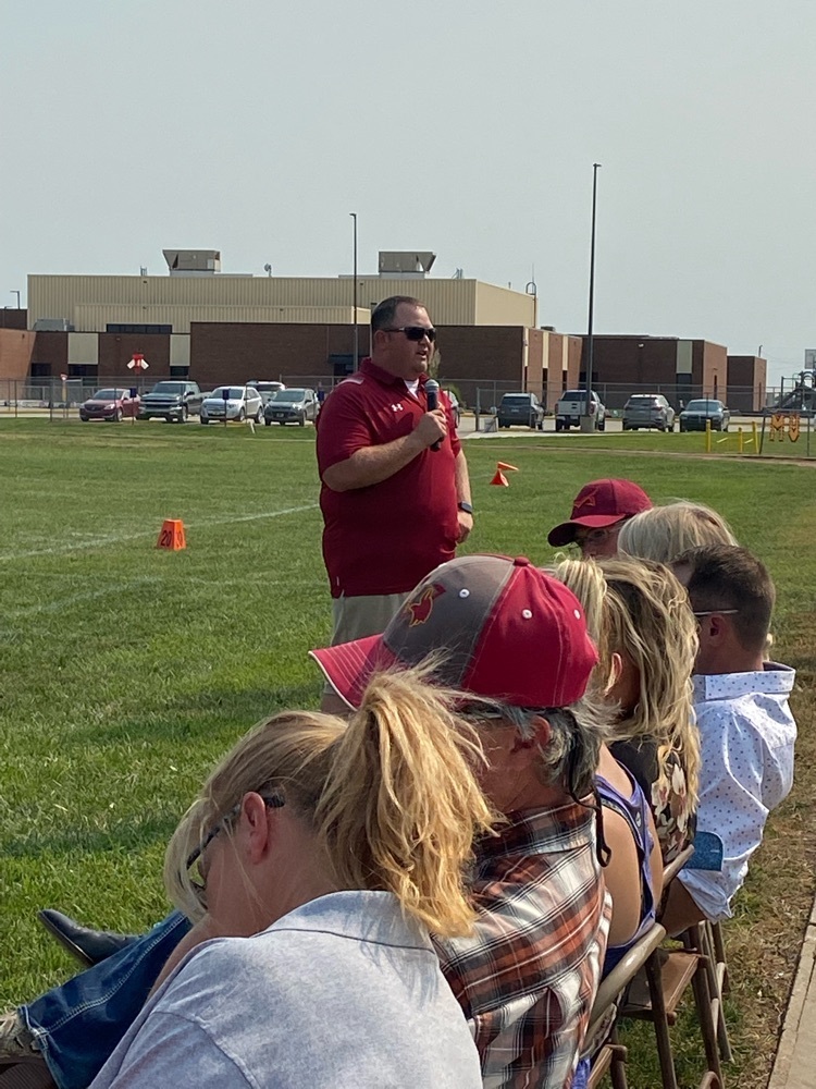 Coach Vanderbilt speaking at the pep assembly